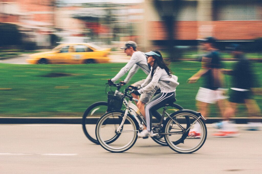 A man and woman cycling